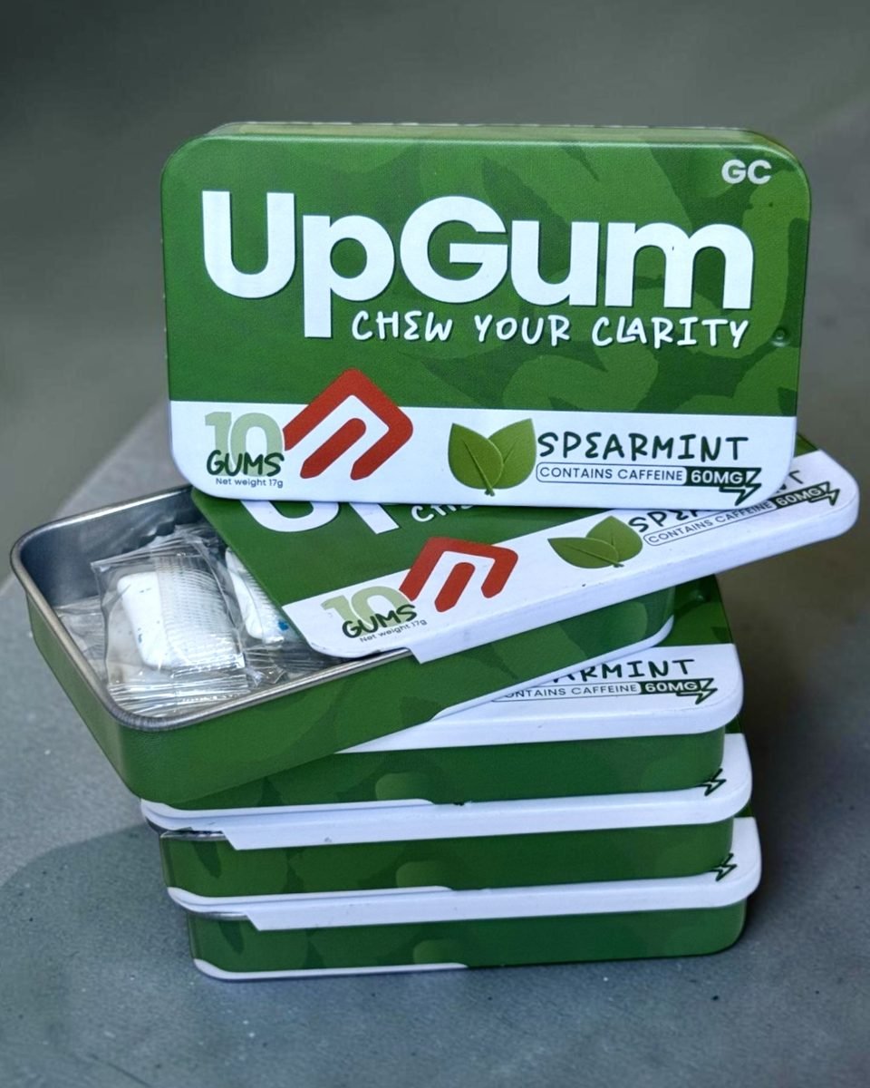 Five Spearmint UpGum tins, one open