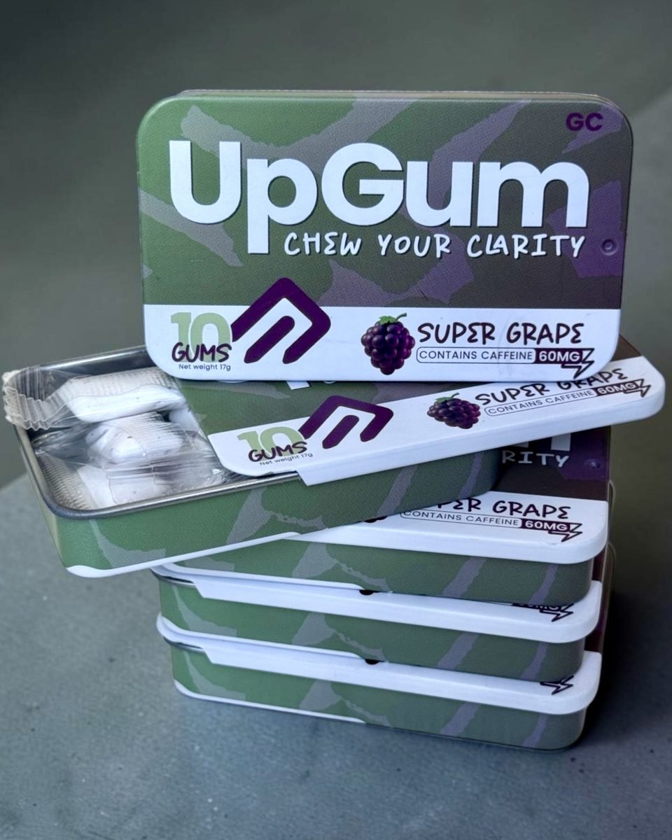 Five Super Grape UpGum tins, one open