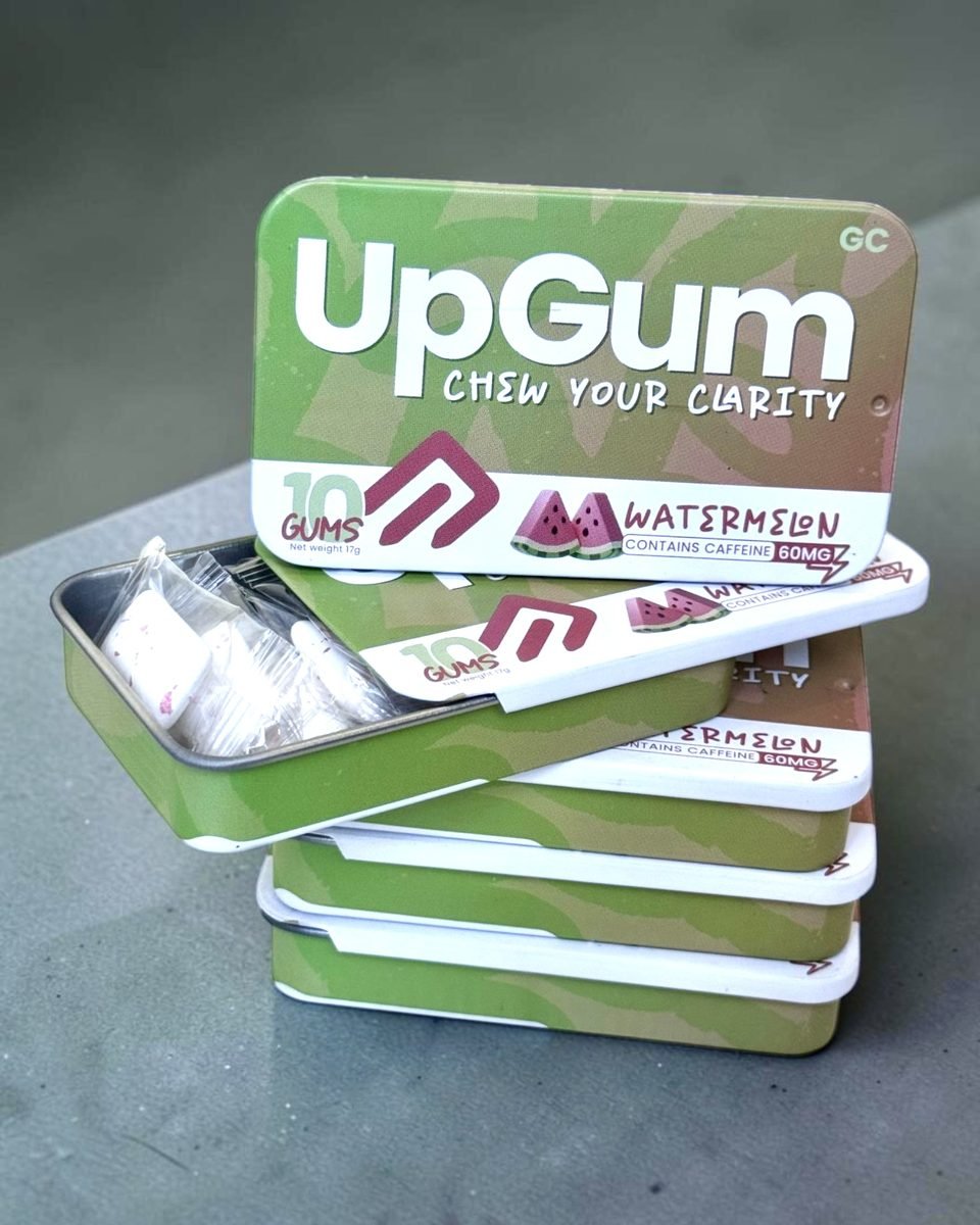Five Watermelon UpGum tins, one open